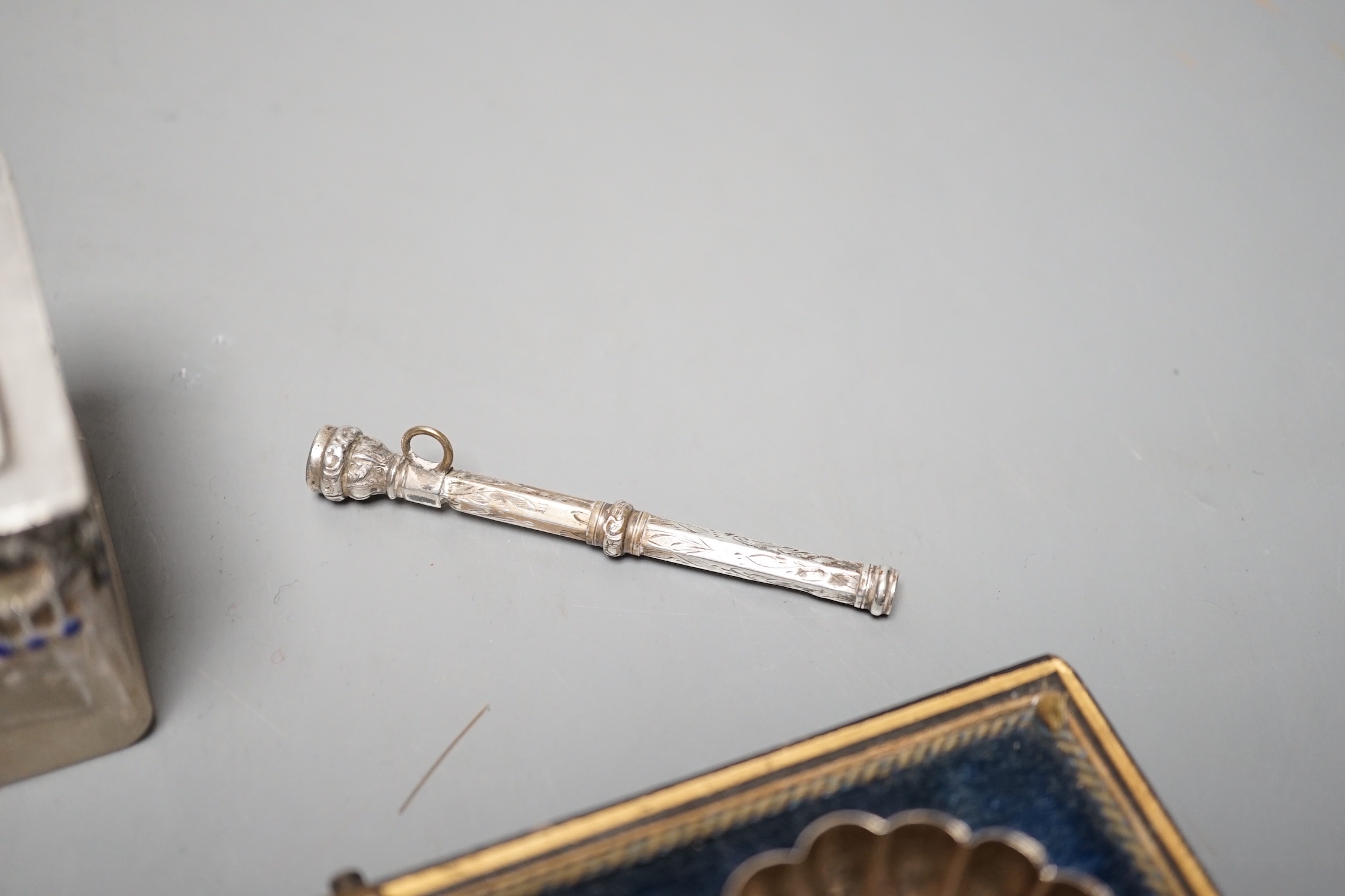 An Austro-Hungarian and enamel mounted glass pot and cover, a cased pair of silver shell salts, a propelling pencil and a cased silver three piece cruet set.